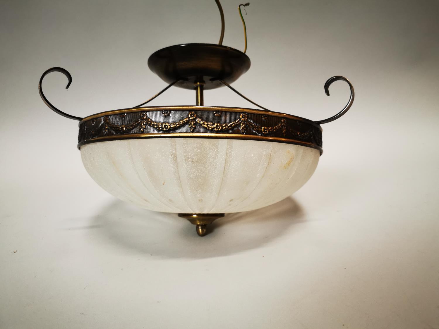 Brass and glass hanging lamp shade.