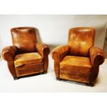 Pair of 1940's leather club chairs.