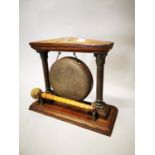 Early 20th. C. oak and metal dinner gong.