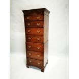 Mahogany tallboy with brass handles.