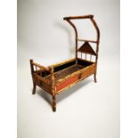 Early 20th C. bamboo doll's cot.