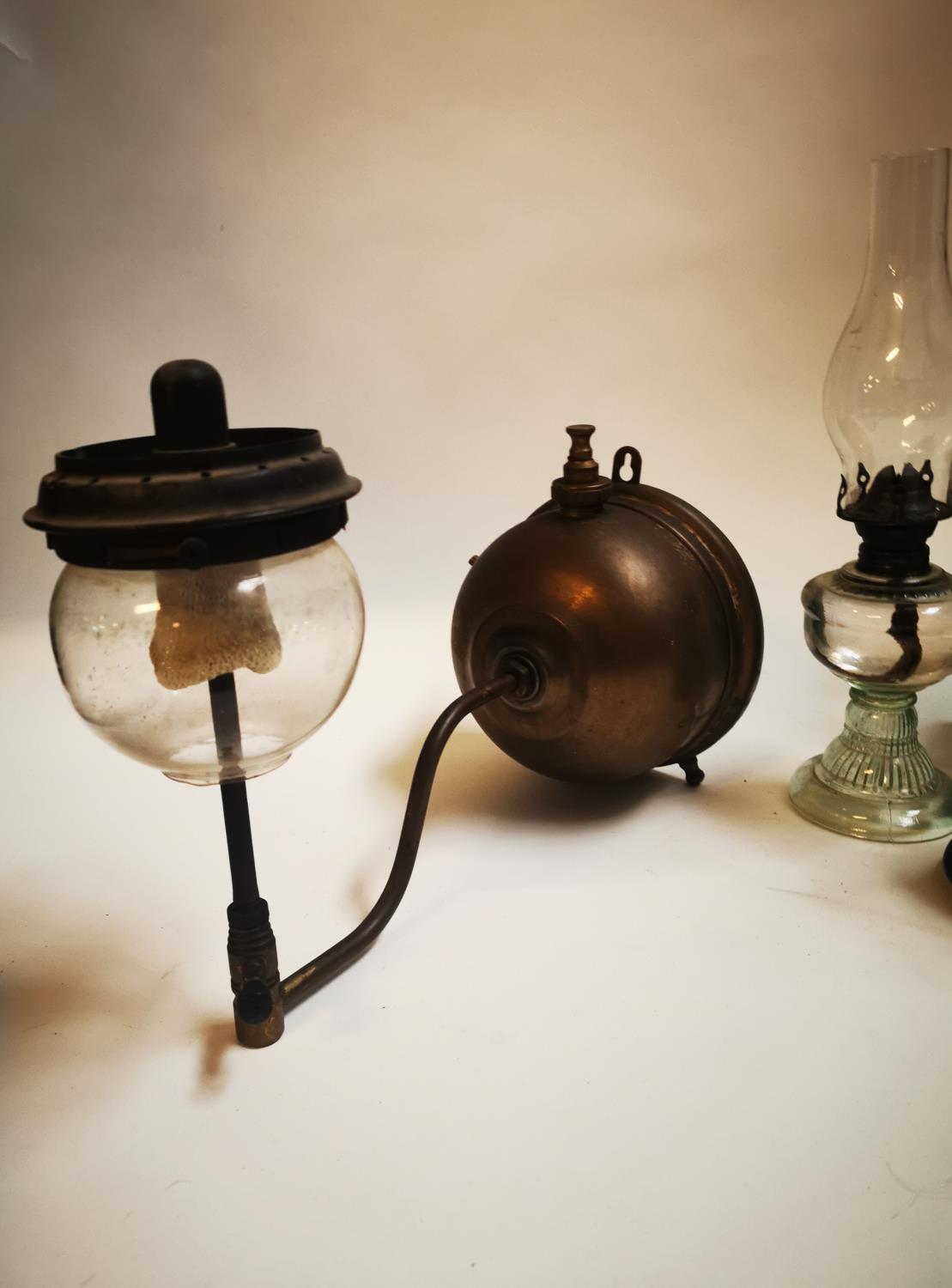 Collection of early 20th C. thumb lamps and a tilly lamp. - Image 4 of 4
