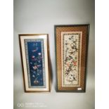 Two Oriental framed embroidered panels.