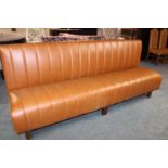 Ribbed leather upholstered bar seating.