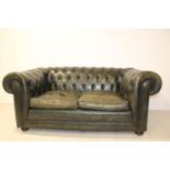 Leather chesterfield sofa.