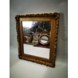 Victorian giltwood and gesso wall mirror.