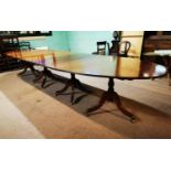 Mahogany four pillared dining table.