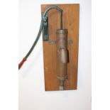 19th C. copper wall water pump.