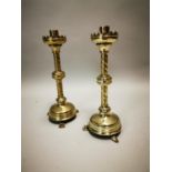 Set of brass ecclesiastical candlesticks.
