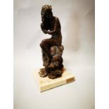 Spelter figure of a girl bathing.