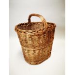 Early 20th C. wicker log basket.