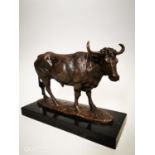 Bronze model of a bull.