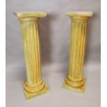 Pair of 20th C. marbleised plaster pedestals.