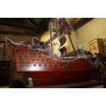 Model of a rosewood Sailing ship.