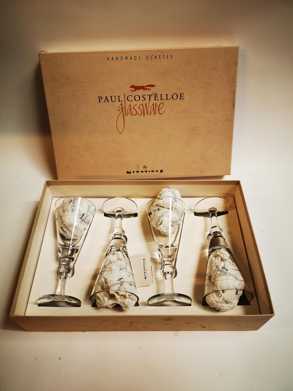 Set of four Paul Costello glasses.