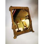 Brass mirror in the Art Deco style.