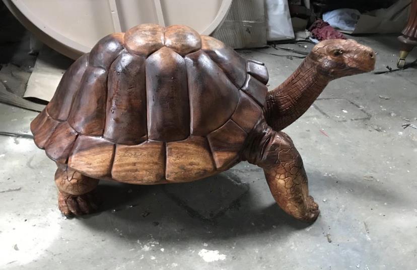 Carved wooden turtle of a tortoise.