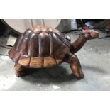 Carved wooden turtle of a tortoise.