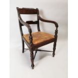 Regency Mahogany open armchair.