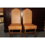 Pair of leather high back chairs.
