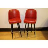 Pair of leather high back swivel chairs.