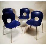 Set of four mid century style dining chairs.