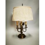 Brass table lamp in the Rococo style.