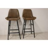 Pair of leather high stools.