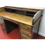 Early 20th C. oak roll top desk.