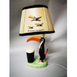 Guinness Toucan Arklow Pottery advertising lamp with shade.