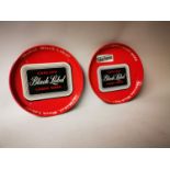 Two Carling Black Label advertising drinks trays.