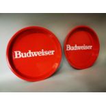 Two Budweiser advertising drinks trays.