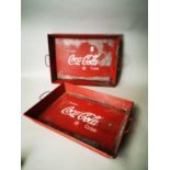Two Coca Cola advertising drinks trays.