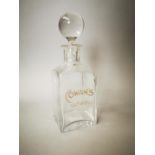 Cowan's Whiskey advertising decanter.