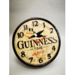 Guinness Time advertising clock.