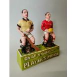 Resin model of Players Please footballers.