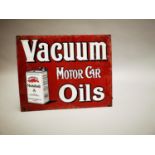 Vacuum Motor Oils advertising sign.