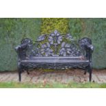 Cast iron garden seat with dog head decoration W 150 H 90 D 70