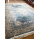 Wool centre rug with floral decoration throughout 305 x 420