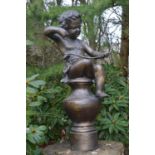 Quality bronze figure of a cherub holding a bow seated on a pedestal W 50 H 100