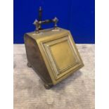 Aesthetic brass slope front coal scuttle complete with brush, both with ebony handles W 27 H 40 D