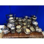 Large collection of silver plated tea sets.