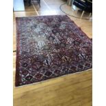 Persian design centre rug (some fading) 220 x 300