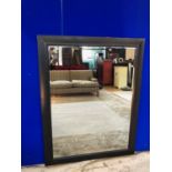 Dark stained bevelled framed mirror W 110 H 137