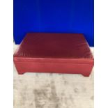G & M Laurence: Red leather ottoman W 142 H 45 D 100
