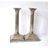 Pair of Victorian Corinthian column silver candlesticks. Sheffield 1885. Makers Hawksworth, Eyre and