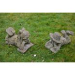 Pair of stone figures modelled as a boy and girl reading W 50 H 36 D 26