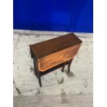 Edwardian mahogany Sutherland table with crossbanded top, gate leg action and ceramic casters W 50 H