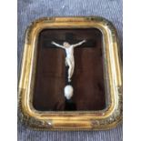 19th Century framed ivory figure of Jesus on the cross with skull beneath, very finely detailed W 35