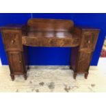 Georgian bow fronted mahogany pedestal sideboard, the pedestals containing 2 cupboards on sabre feet